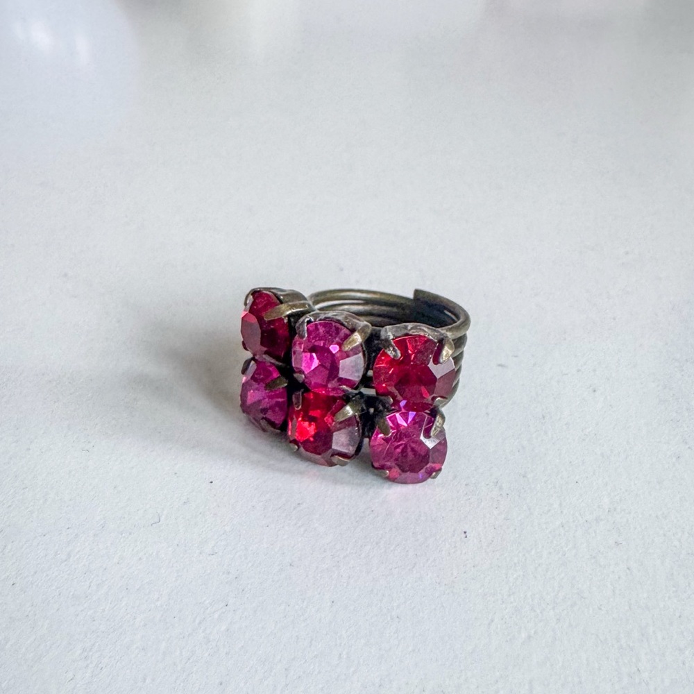 Multi colored stone ring, red & pink stones, dark gold band